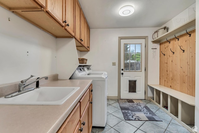 233 N Main St, Alpine, UT 84004 - laundry area with washing machine and dryer, light tile patterned floors, and cabinet space