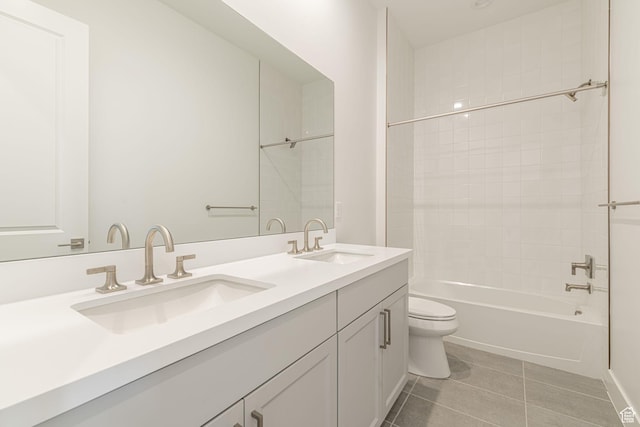705 W Emerald Point Dr, St George, UT 84790 - bathroom with toilet, double vanity, tile patterned floors, and tub / shower combination