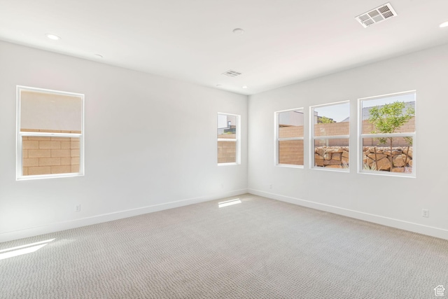 705 W Emerald Point Dr, St George, UT 84790 - unfurnished room featuring light carpet, baseboards, and recessed lighting