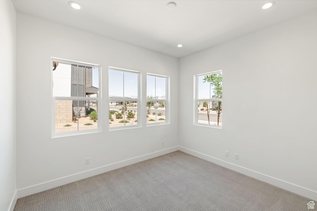 705 W Emerald Point Dr, St George, UT 84790 - spare room with light colored carpet, baseboards, and recessed lighting