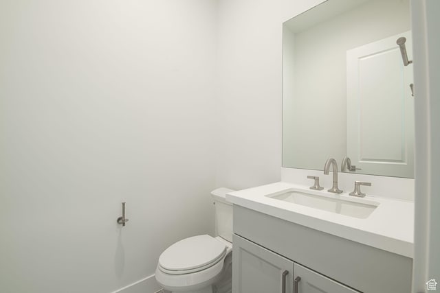 705 W Emerald Point Dr, St George, UT 84790 - bathroom with vanity, toilet, and baseboards