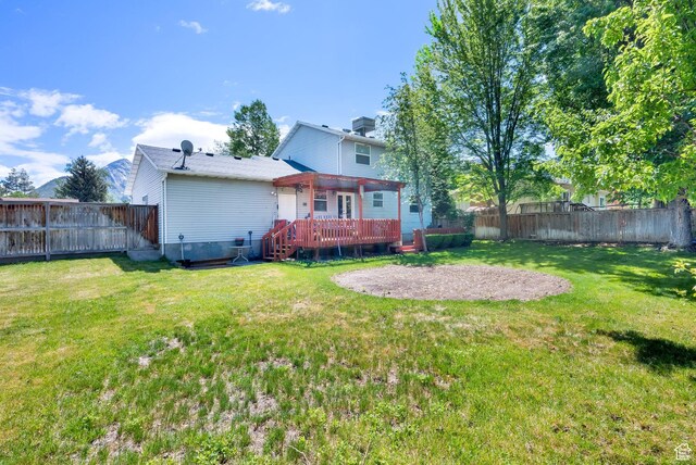 10132 S Kalinda Dr, Sandy, UT 84092 - back of property with a deck