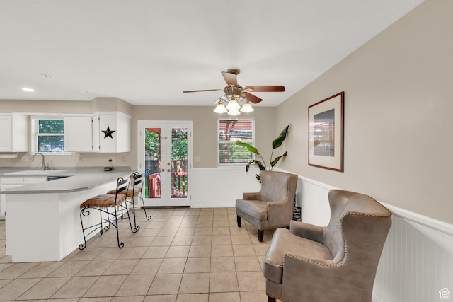 10132 S Kalinda Dr, Sandy, UT 84092 - living room with plenty of natural light, light tile patterned floors, and ceiling fan