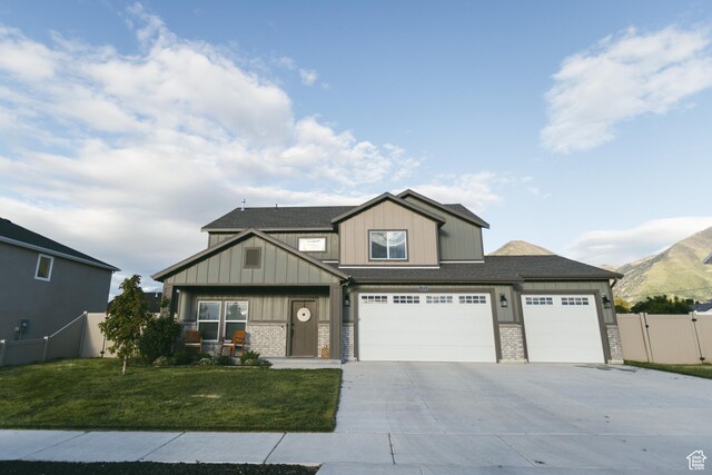 172 N 200 E, Salem, UT 84653 - craftsman-style house with board and batten siding, concrete driveway, a garage, and a shingled roof
