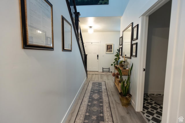 172 N 200 E, Salem, UT 84653 - hallway with light wood finished floors, stairway, and baseboards