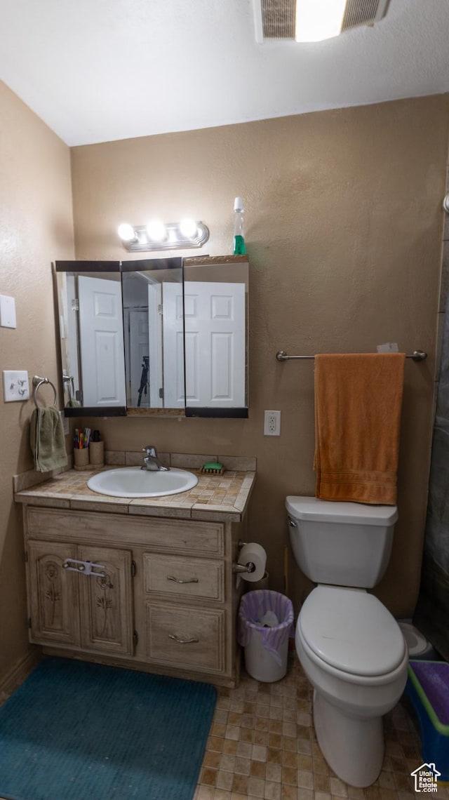 405 Bramblewood Dr, Cedar City, UT 84721 - bathroom featuring vanity and toilet