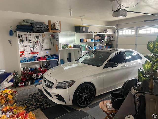 4422 W 2425 N, Plain City, UT 84404 - garage featuring a garage door opener