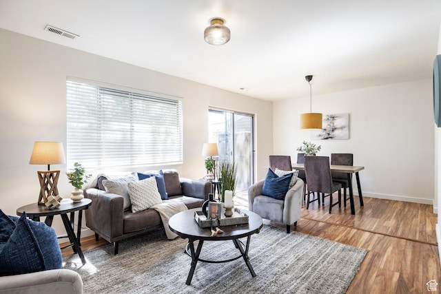 870 N 160 W Unit 3, Orem, UT 84057 - living room featuring light wood-type flooring and baseboards