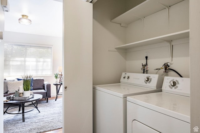 870 N 160 W Unit 3, Orem, UT 84057 - laundry room with washer and clothes dryer and light wood-style flooring
