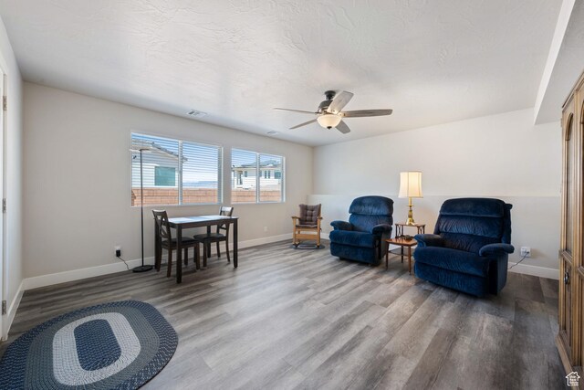 1160 N Main St, Hurricane, UT 84737 - living area with wood finished floors, baseboards, and ceiling fan