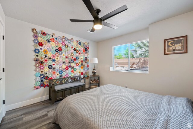 1160 N Main St, Hurricane, UT 84737 - bedroom with wood finished floors, baseboards, and ceiling fan