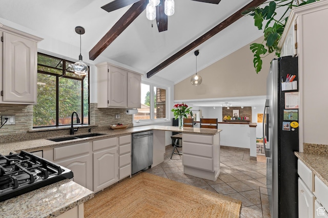 1616 E Waters Ln, Sandy, UT 84093 - kitchen with appliances with stainless steel finishes, a sink, backsplash, decorative light fixtures, and ceiling fan