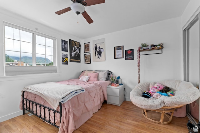 1616 E Waters Ln, Sandy, UT 84093 - bedroom featuring wood finished floors, baseboards, and ceiling fan
