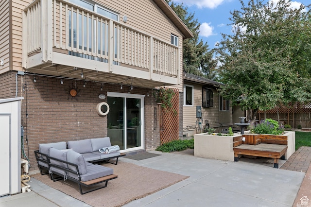 1616 E Waters Ln, Sandy, UT 84093 - view of patio featuring an outdoor hangout area and a balcony