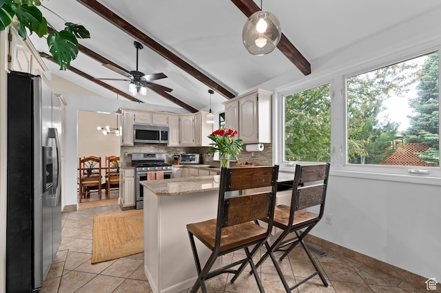 1616 E Waters Ln, Sandy, UT 84093 - kitchen with stainless steel appliances, a peninsula, backsplash, light tile patterned floors, and a ceiling fan
