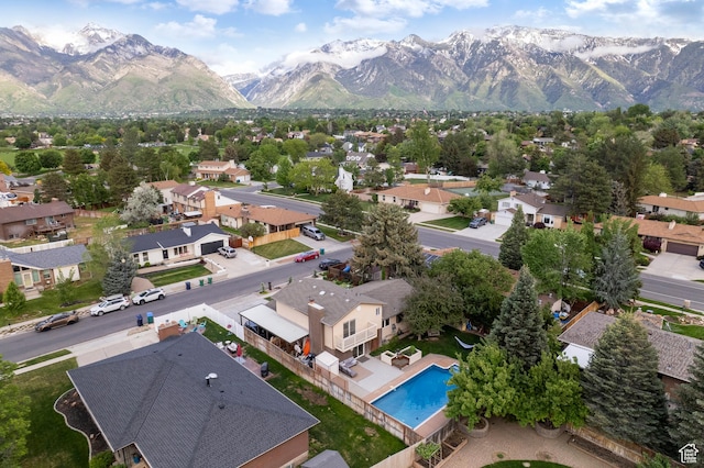 1616 E Waters Ln, Sandy, UT 84093 - aerial view of residential area with a mountainous background and a pool