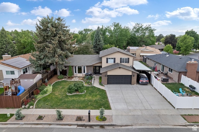1616 E Waters Ln, Sandy, UT 84093 - view of front of property with a carport, a garage, a residential view, concrete driveway, and roof with shingles