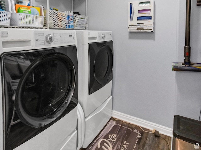 1038 N Plaza Dr, Richfield, UT 84701 - washroom featuring baseboards, separate washer and dryer, and wood finished floors