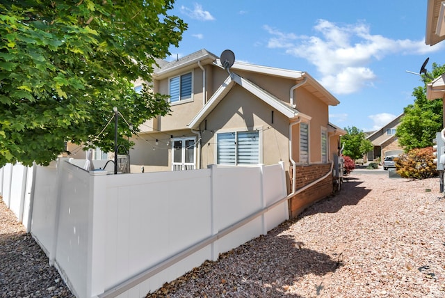 1038 N Plaza Dr, Richfield, UT 84701 - view of property exterior with stucco siding