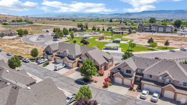 1038 N Plaza Dr, Richfield, UT 84701 - aerial view of residential area featuring a mountainous background