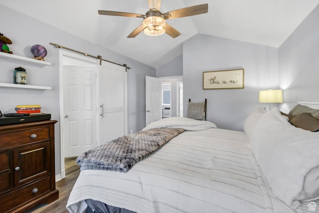 1038 N Plaza Dr, Richfield, UT 84701 - bedroom with a barn door, lofted ceiling, dark wood-type flooring, and ceiling fan