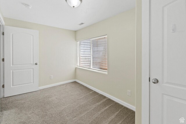 1038 N Plaza Dr, Richfield, UT 84701 - unfurnished bedroom featuring carpet and baseboards