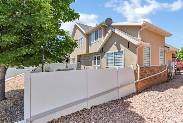 1038 N Plaza Dr, Richfield, UT 84701 - view of property exterior featuring stucco siding