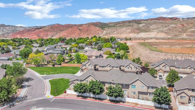 1038 N Plaza Dr, Richfield, UT 84701 - aerial view of residential area featuring a mountainous background