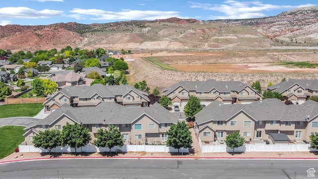 1038 N Plaza Dr, Richfield, UT 84701 - aerial perspective of suburban area featuring a mountainous background