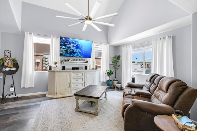 1038 N Plaza Dr, Richfield, UT 84701 - living area with ceiling fan, wood finished floors, baseboards, and high vaulted ceiling