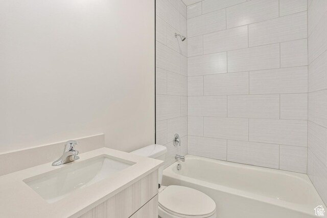 321 E 2100 S Unit 4, Salt Lake City, UT 84115 - bathroom featuring toilet, tub / shower combination, and vanity