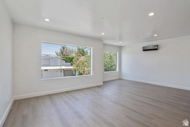 321 E 2100 S Unit 4, Salt Lake City, UT 84115 - empty room with wood finished floors, recessed lighting, and baseboards