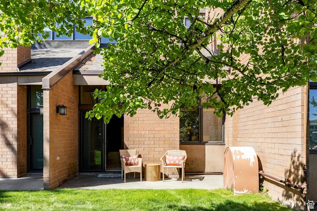 1672 Captain Molly Dr Unit 330, Park City, UT 84060 - rear view of property featuring brick siding and a patio area