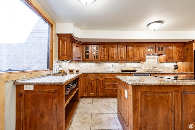 1672 Captain Molly Dr Unit 330, Park City, UT 84060 - kitchen featuring brown cabinetry, decorative backsplash, and light stone countertops