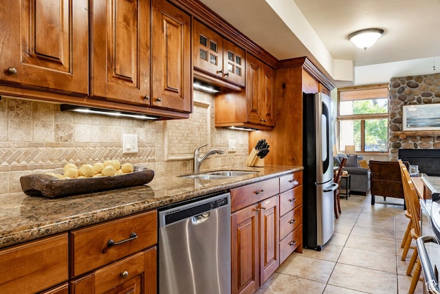 1672 Captain Molly Dr Unit 330, Park City, UT 84060 - kitchen with stainless steel appliances, a sink, dark stone counters, and tasteful backsplash