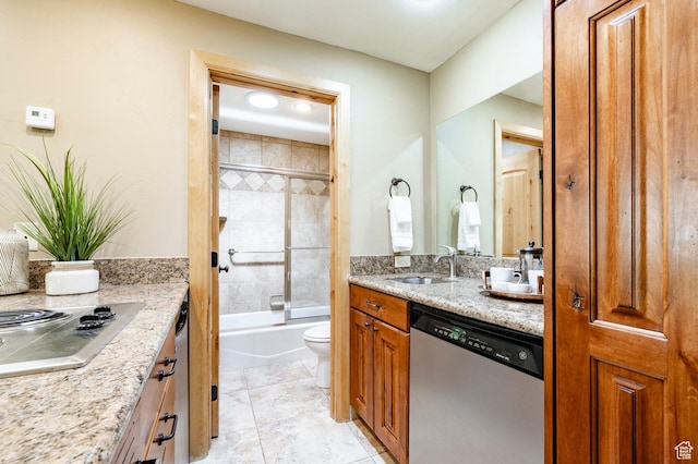 1672 Captain Molly Dr Unit 330, Park City, UT 84060 - bathroom with toilet, vanity, and bath / shower combo with glass door