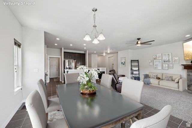 14499 S River Chase Rd, Herriman, UT 84096 - dining area with a chandelier, baseboards, a ceiling fan, and recessed lighting