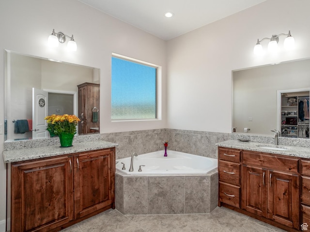 814 N High Ground Dr, Dammeron Valley, UT 84783 - bathroom with vanity, a garden tub, and tile patterned floors