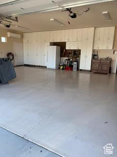 814 N High Ground Dr, Dammeron Valley, UT 84783 - garage with freestanding refrigerator