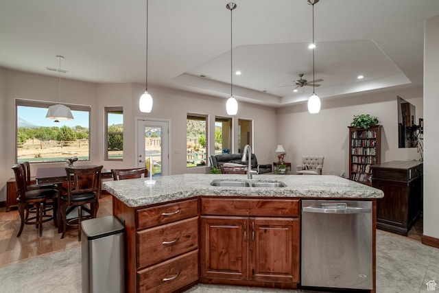 814 N High Ground Dr, Dammeron Valley, UT 84783 - kitchen with dishwasher, a sink, a tray ceiling, open floor plan, and recessed lighting