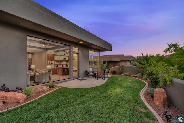 2549 W Sinagua Trl Unit 26, St George, UT 84770 - view of grassy yard featuring a patio area