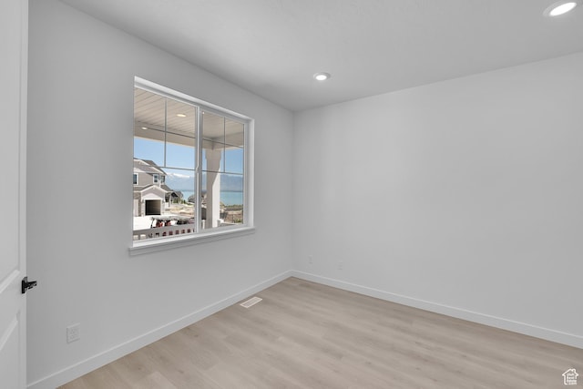 127 E Heron Ave Unit 808, Saratoga Springs, UT 84045 - unfurnished room with wood finished floors, recessed lighting, and baseboards