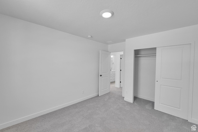 127 E Heron Ave Unit 808, Saratoga Springs, UT 84045 - unfurnished bedroom with carpet flooring, baseboards, and a closet