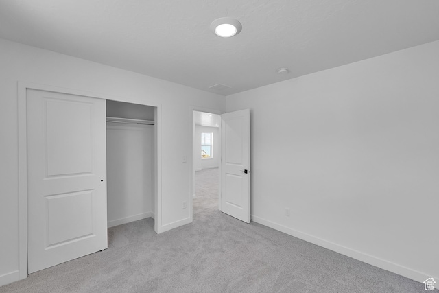 127 E Heron Ave Unit 808, Saratoga Springs, UT 84045 - unfurnished bedroom featuring carpet floors, baseboards, and a closet