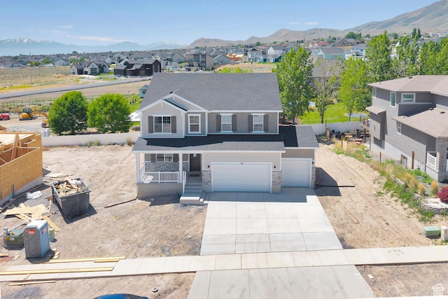127 E Heron Ave Unit 808, Saratoga Springs, UT 84045 - traditional-style home with a residential view, covered porch, concrete driveway, an attached garage, and a mountain view