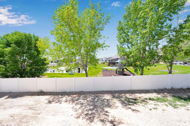 127 E Heron Ave Unit 808, Saratoga Springs, UT 84045 - view of yard featuring a playground and a residential view