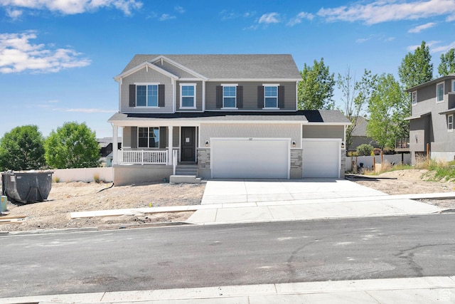 127 E Heron Ave Unit 808, Saratoga Springs, UT 84045 - craftsman-style home featuring covered porch, stone siding, driveway, and a garage