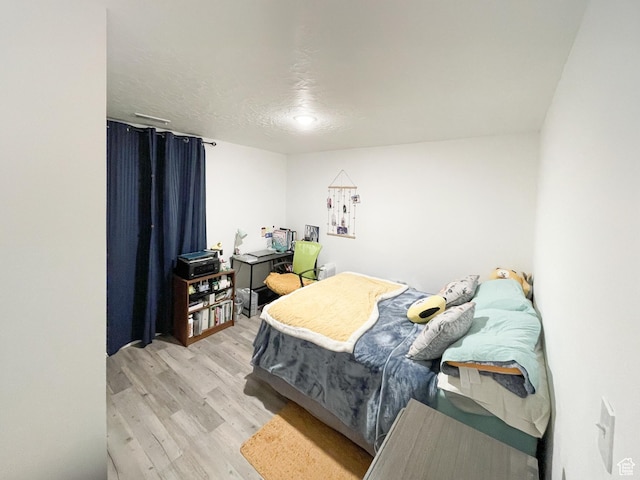 47 E Broxburn Way N, Tooele, UT 84074 - bedroom with light wood-style floors