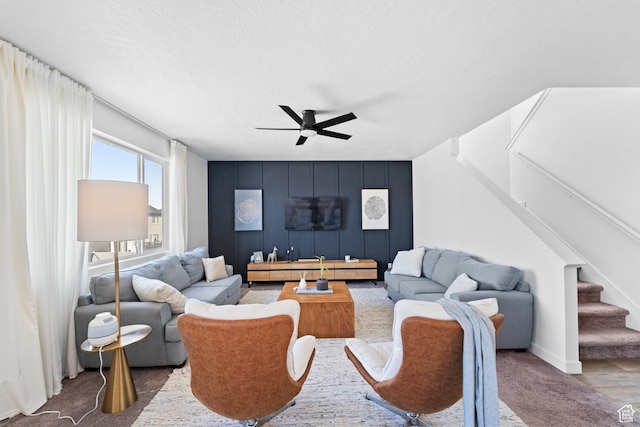 47 E Broxburn Way N, Tooele, UT 84074 - living area featuring ceiling fan, stairway, and baseboards