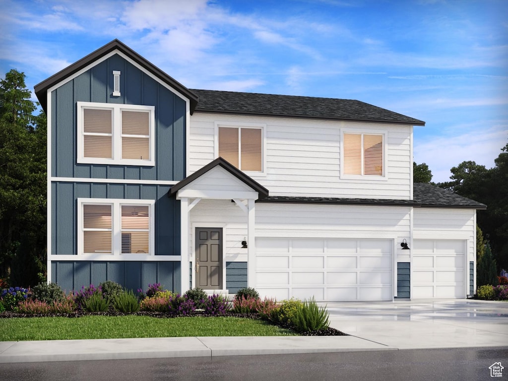 3119 W 3450 S Unit 0172, West Haven, UT 84401 - view of front of property with board and batten siding, a garage, driveway, and a shingled roof